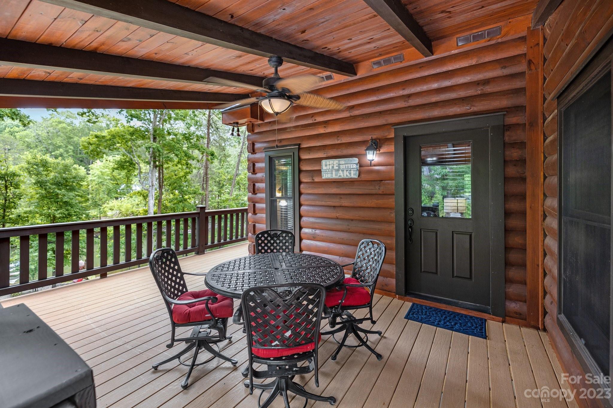 7478 Bankhead Road Denver, NC 28037 - Photo 18 of 48 a view of a dining room with furniture window and wooden floor