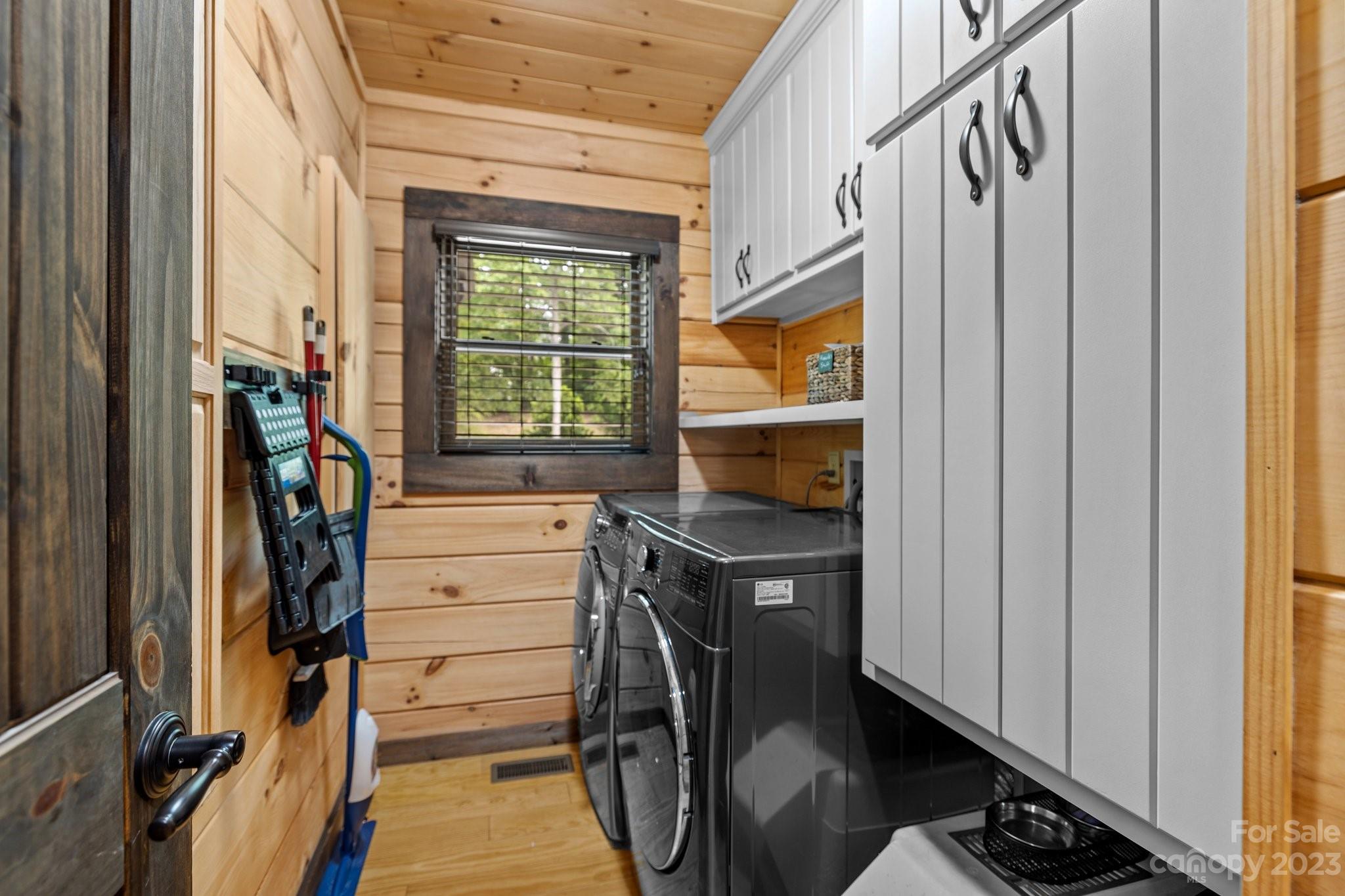 7478 Bankhead Road Denver, NC 28037 - Photo 26 of 48 a view of walk in closet with clothes and shoes