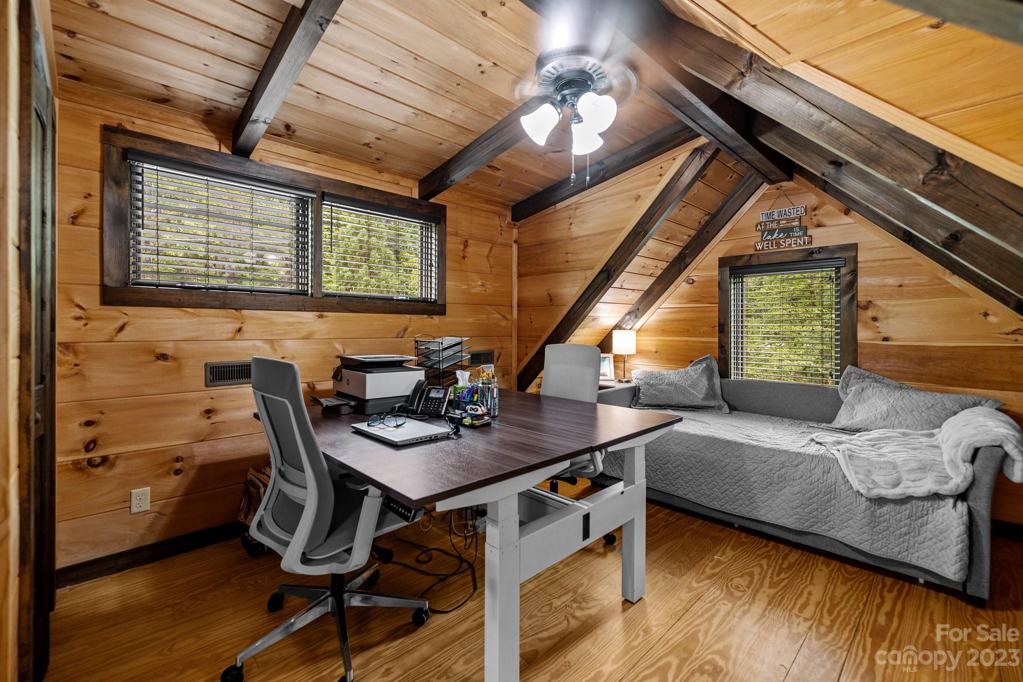 7478 Bankhead Road Denver, NC 28037 - Photo 29 of 48 a view of a dining room with furniture window and wooden floor