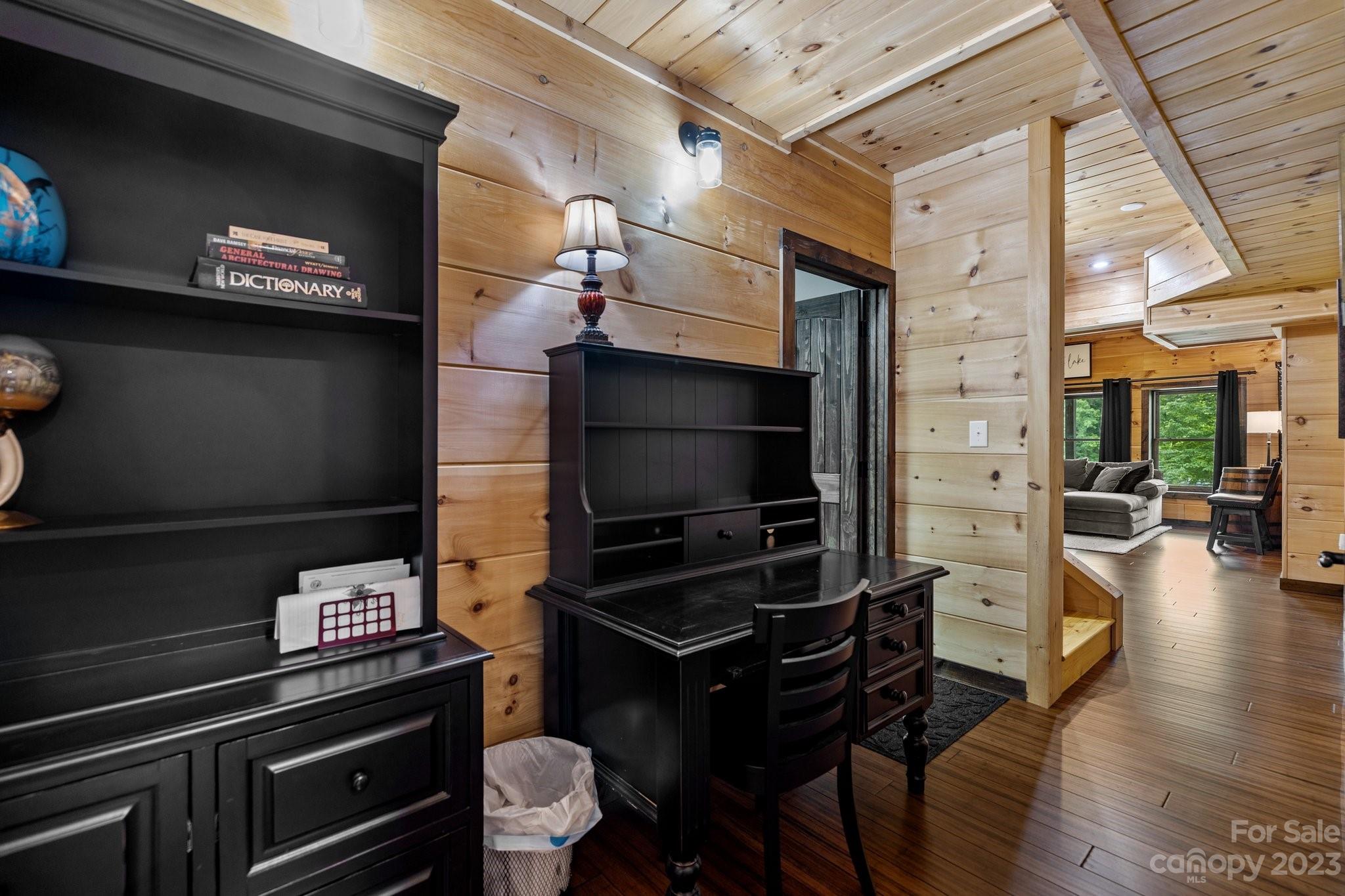 7478 Bankhead Road Denver, NC 28037 - Photo 31 of 48 a kitchen with granite countertop a stove and cabinets