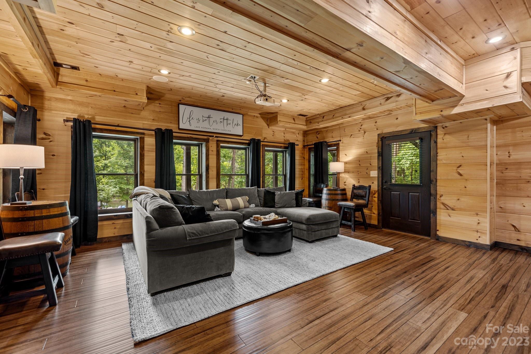 7478 Bankhead Road Denver, NC 28037 - Photo 34 of 48 a living room with furniture and wooden floor
