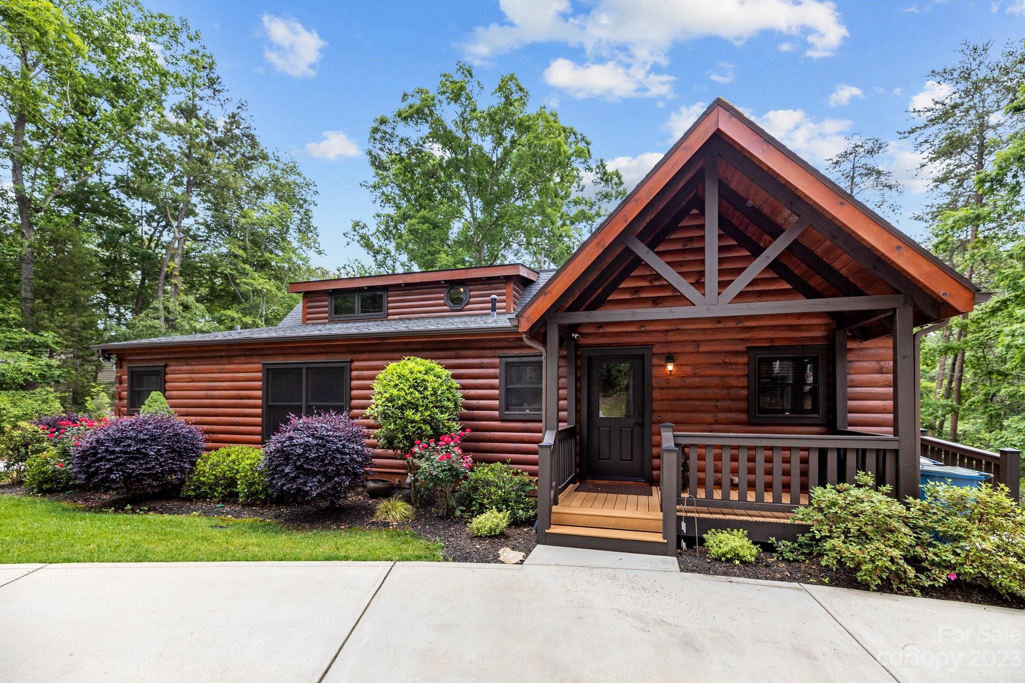 7478 Bankhead Road Denver, NC 28037 - Photo 4 of 48 a front view of a house with garden