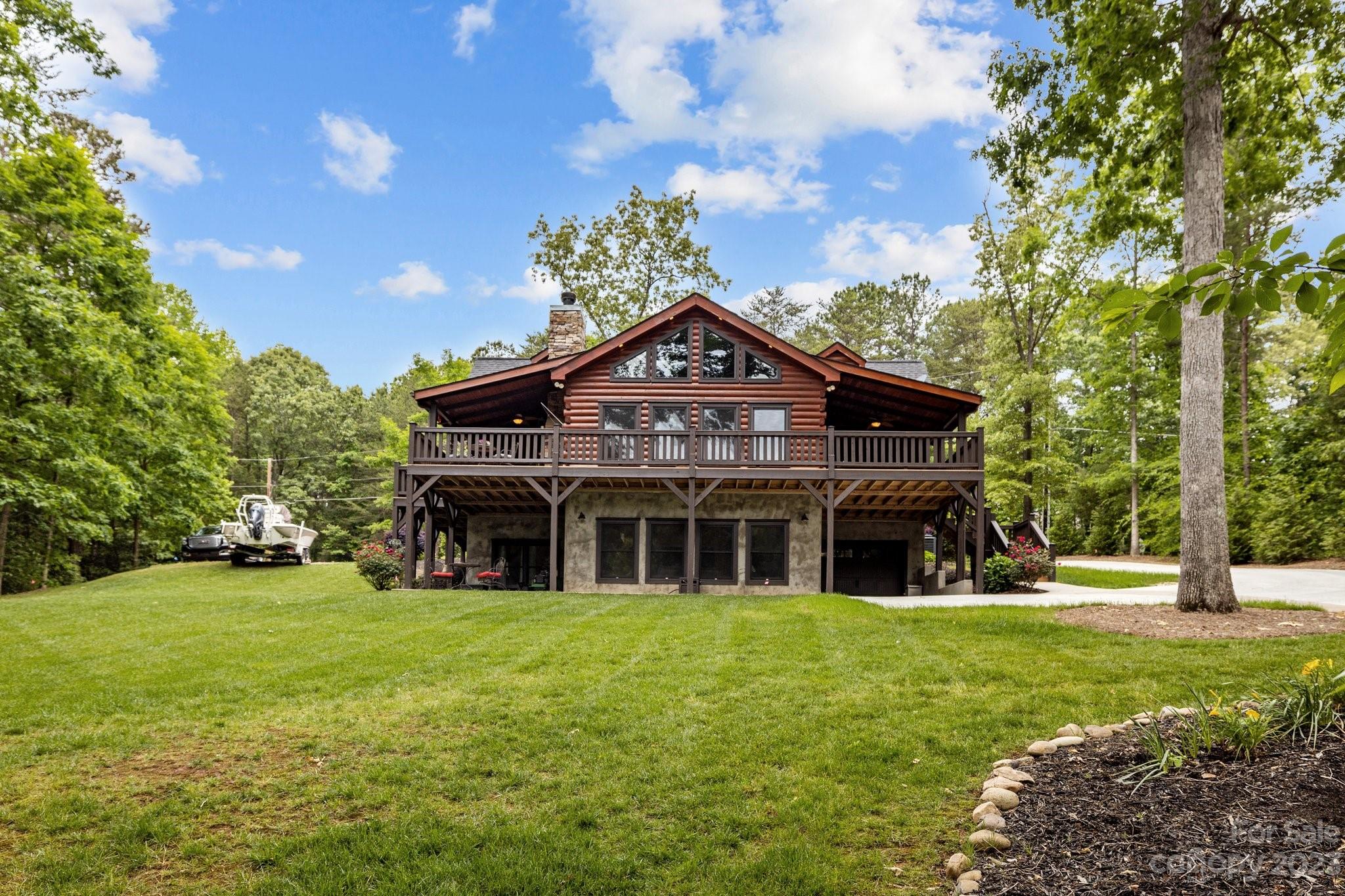 7478 Bankhead Road Denver, NC 28037 - Photo 41 of 48 a front view of a house with a yard