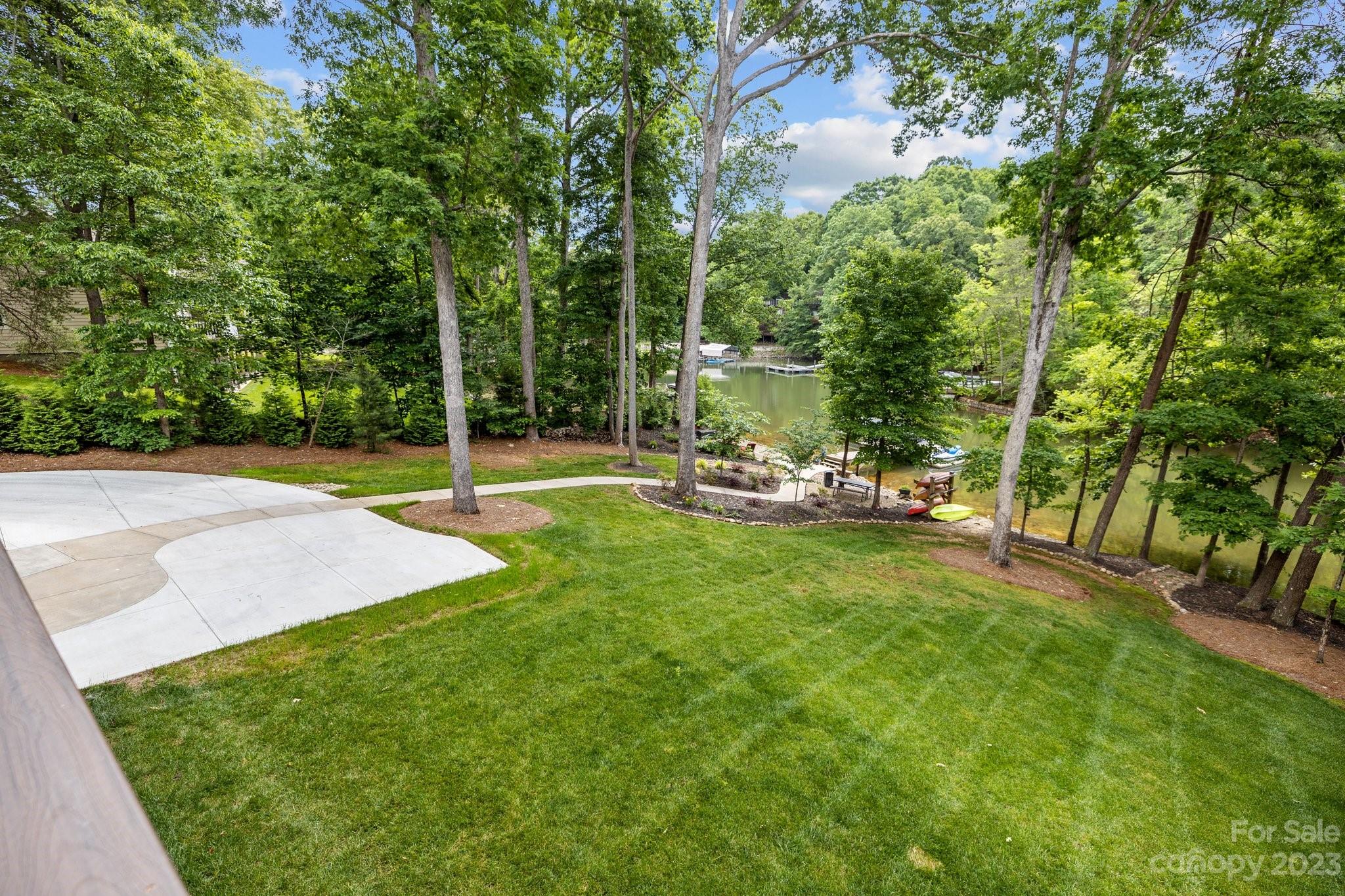 7478 Bankhead Road Denver, NC 28037 - Photo 42 of 48 a view of a park with swings