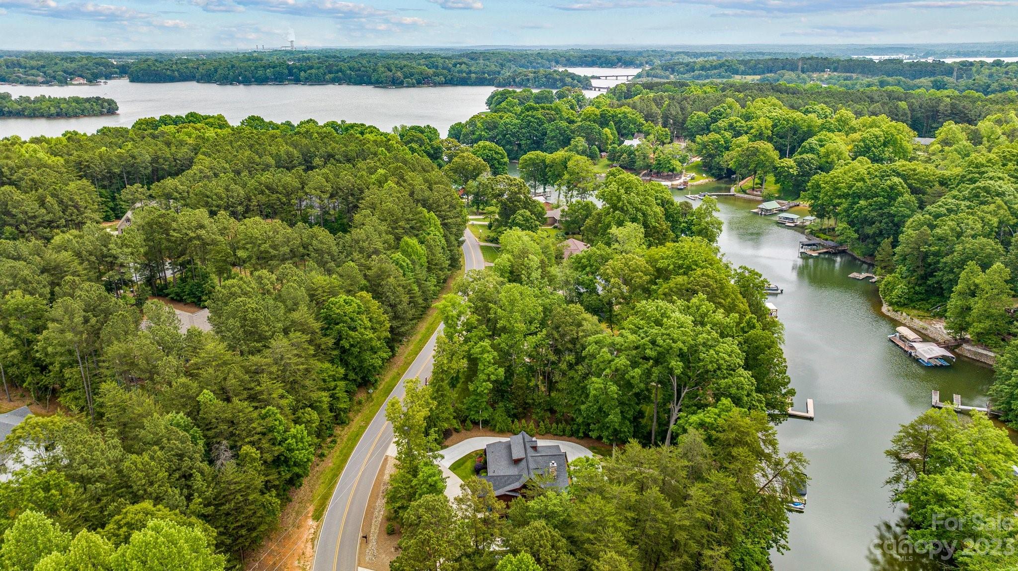 7478 Bankhead Road Denver, NC 28037 - Photo 46 of 48 a view of a lake with a city