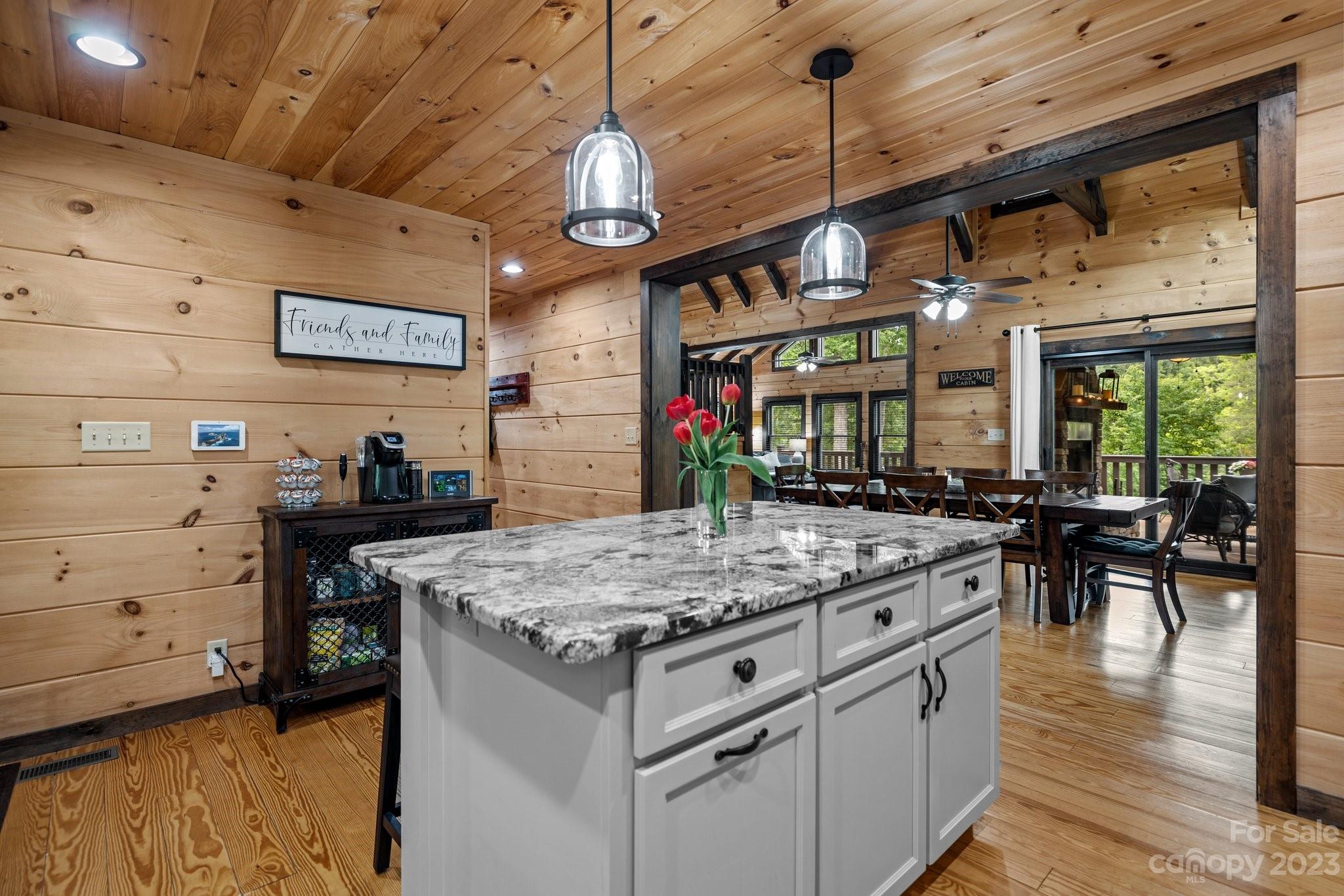 7478 Bankhead Road Denver, NC 28037 - Photo 10 of 48 a kitchen with stainless steel appliances granite countertop a stove and a wooden floors
