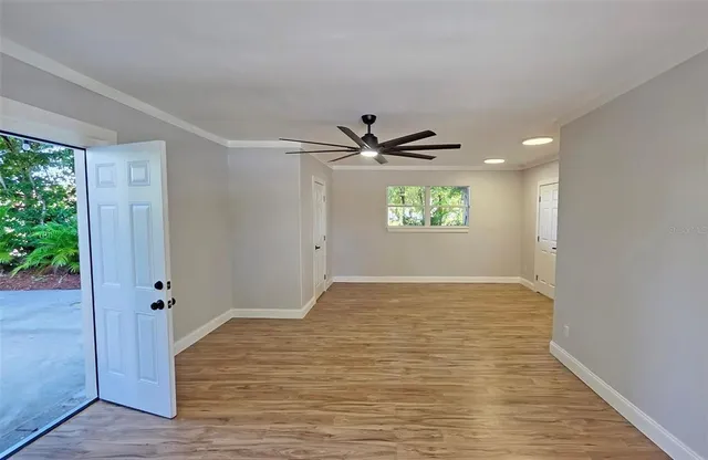 a view of an empty room and window