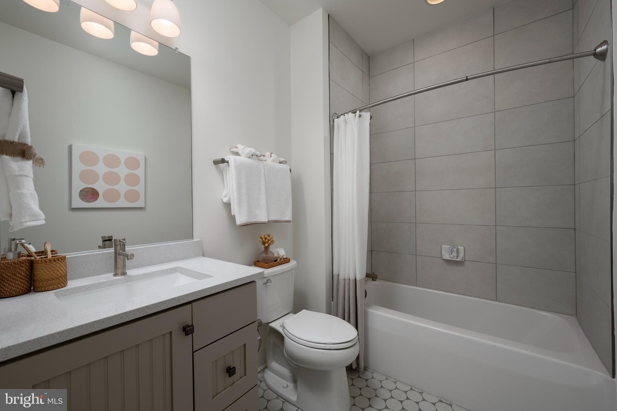 32354 Solara Way Lewes, DE 19958 - Photo 19 of 20 a bathroom with a sink toilet and shower