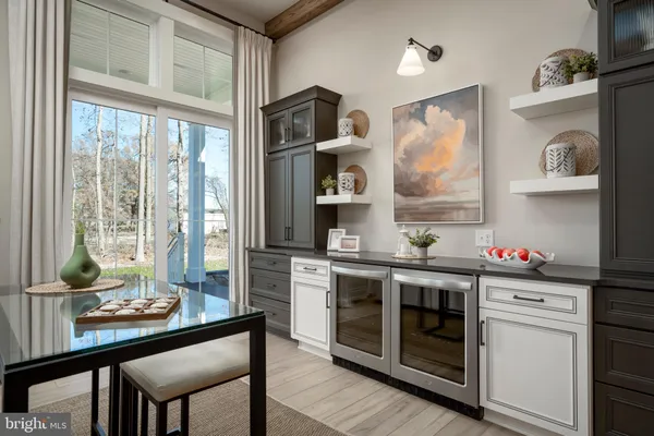 a kitchen with a stove and a refrigerator