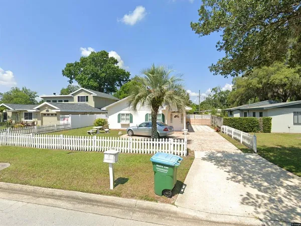 a view of a house with a swimming pool