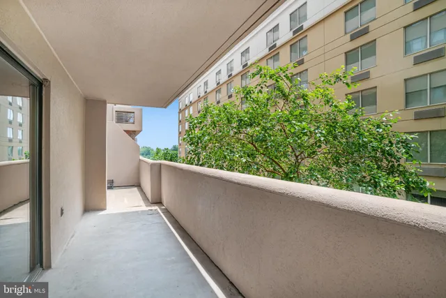 a view of a balcony with an outdoor space