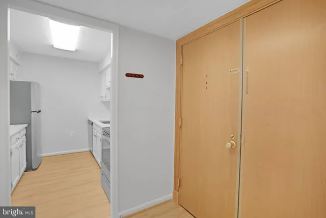 a view of a storage & utility room with closet