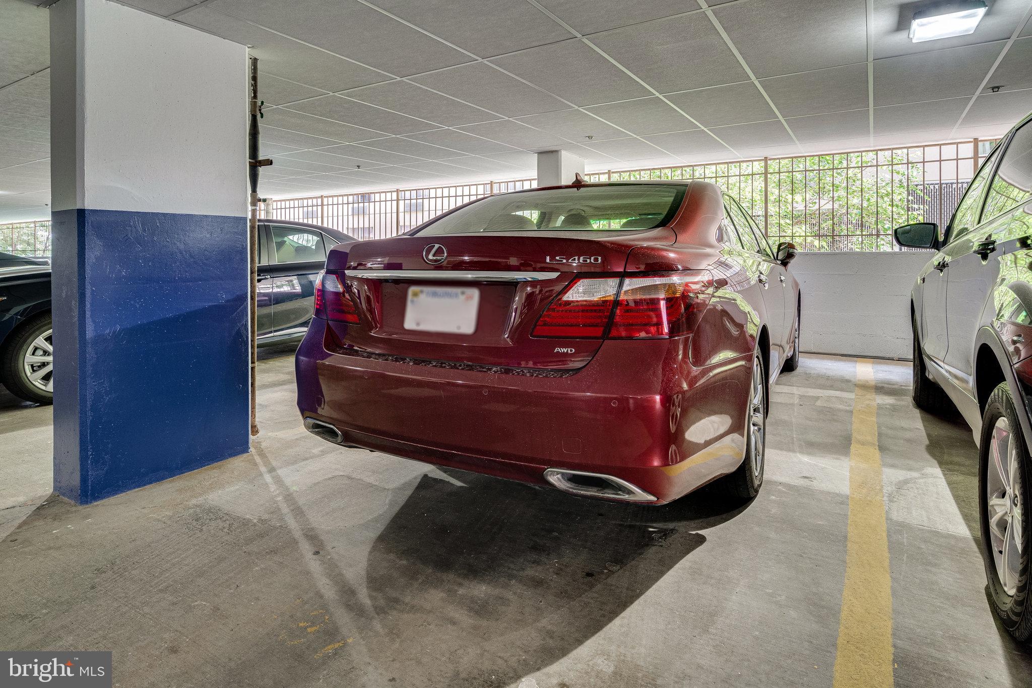 1301 North Courthouse Road, Unit 611 Arlington, VA 22201 - Photo 20 of 32 a bed sitting in a room next to a window
