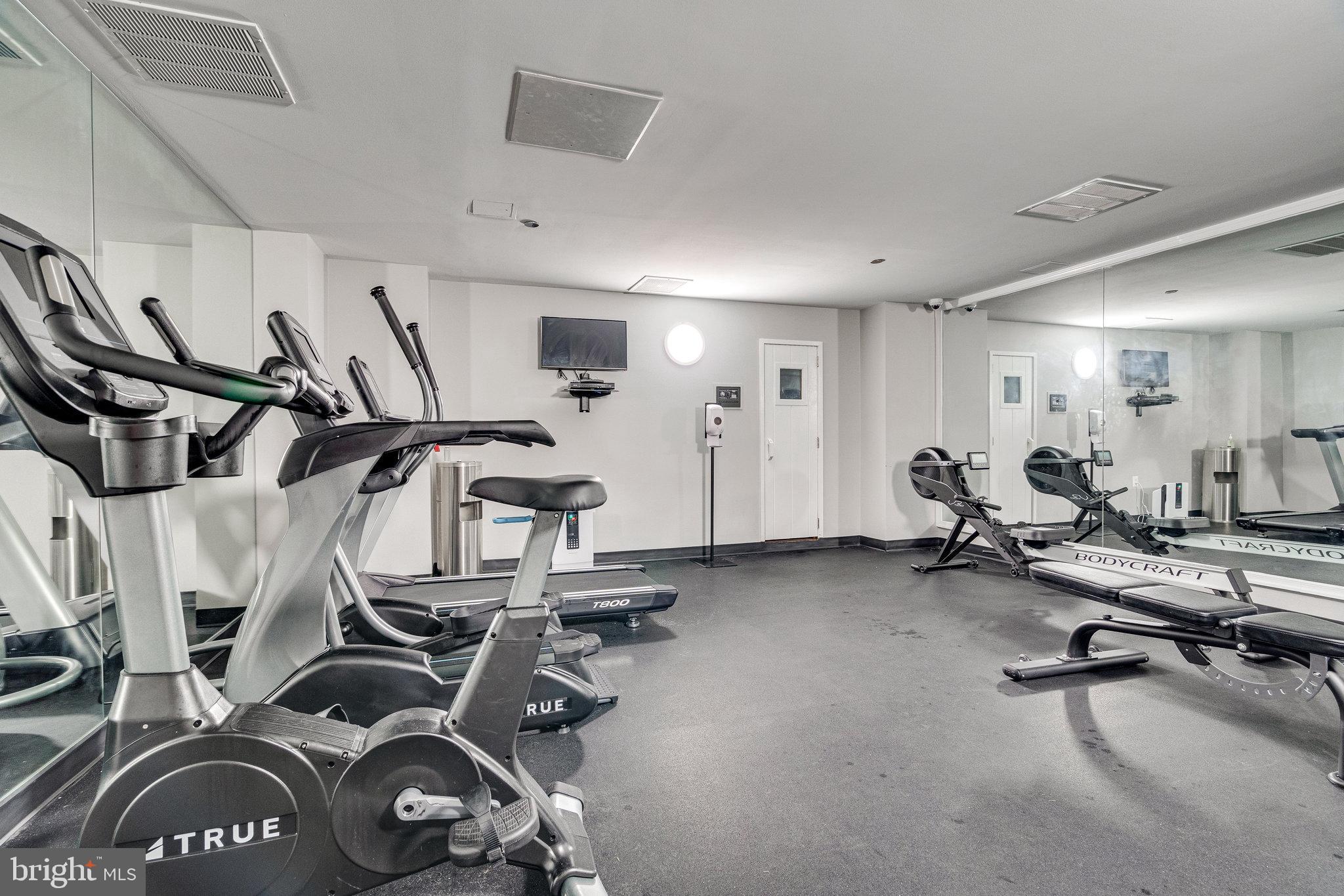 1301 North Courthouse Road, Unit 611 Arlington, VA 22201 - Photo 23 of 32 a view of a room with gym equipment