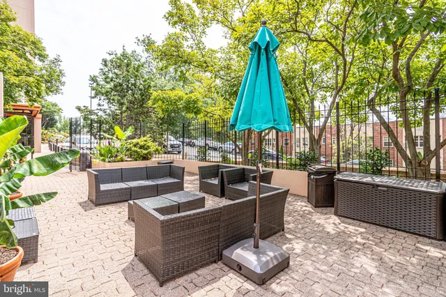 a view of a patio with couches and chairs