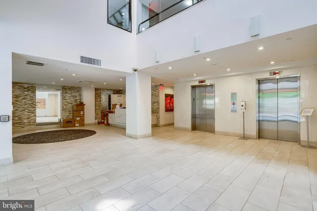 a view of a door with a bench