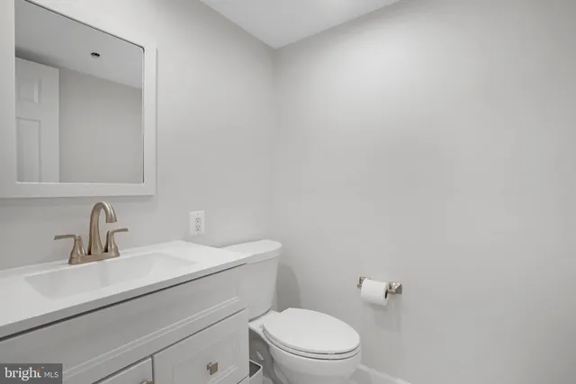 a view of kitchen and wooden floor