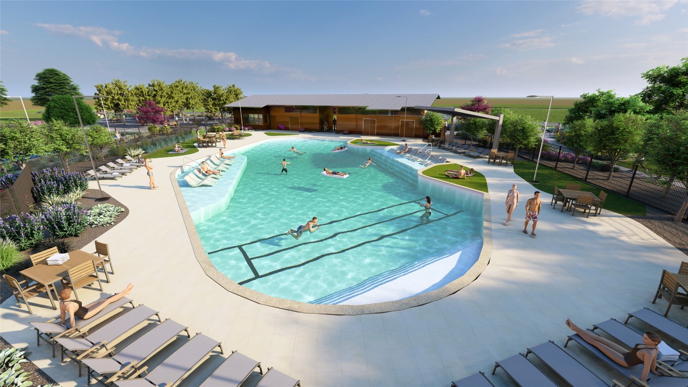 5905 Beverly Pr Road Del Valle, TX 78617 - Photo 18 of 18 an aerial view of a swimming pool with a yard and outdoor seating