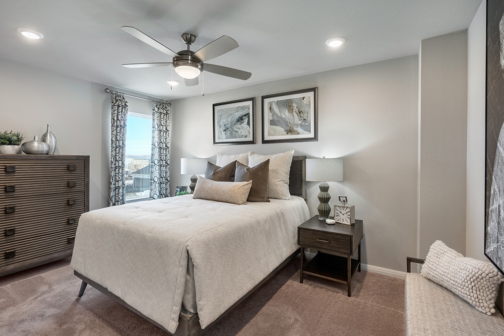 5905 Beverly Pr Road Del Valle, TX 78617 - Photo 5 of 18 a bedroom with a bed and a ceiling fan