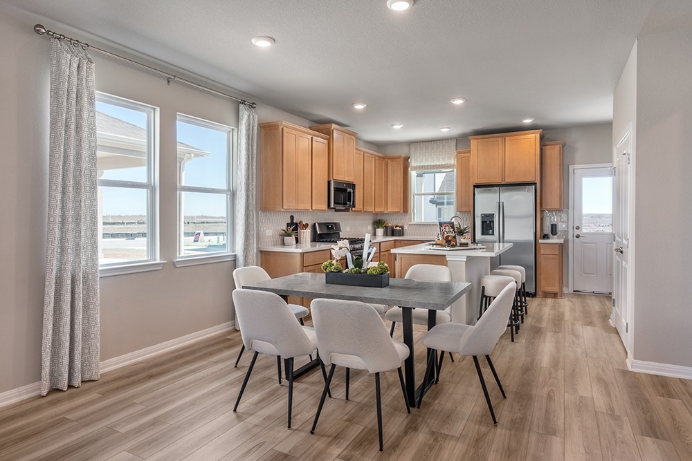 5905 Beverly Pr Road Del Valle, TX 78617 - Photo 6 of 18 a view of a dining room with furniture windows and wooden floor