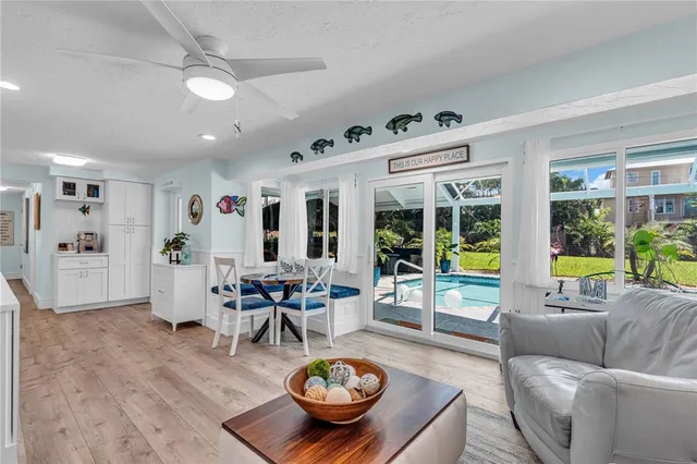 a bathroom with a sink mirror and toilet