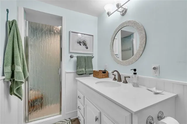 a balcony with outdoor seating and wooden floor