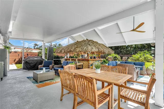 a view of a garden with a building in the background