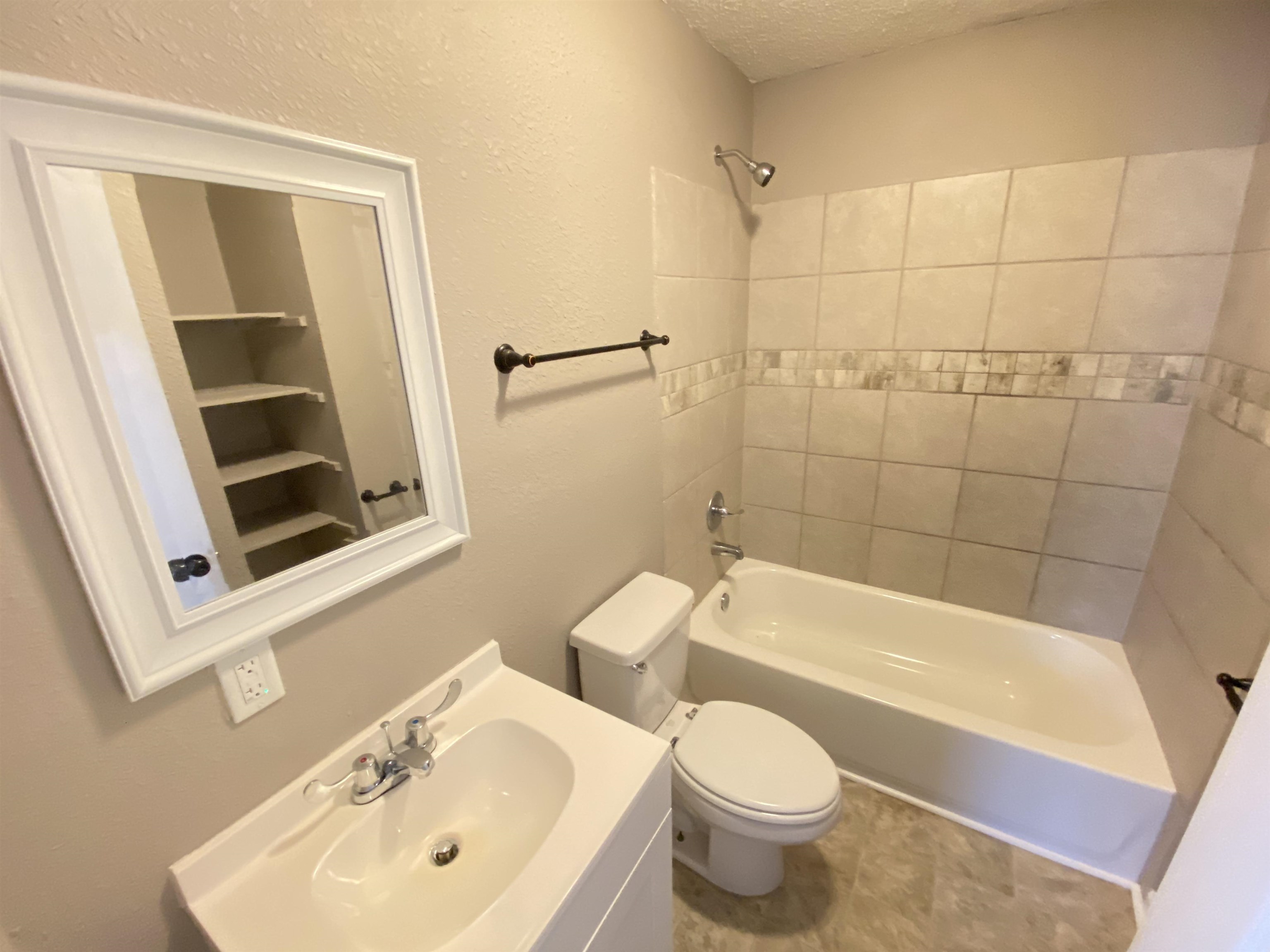 2581 Callie Road Memphis, TN 38127 - Photo 8 of 13 a bathroom with a sink toilet and shower
