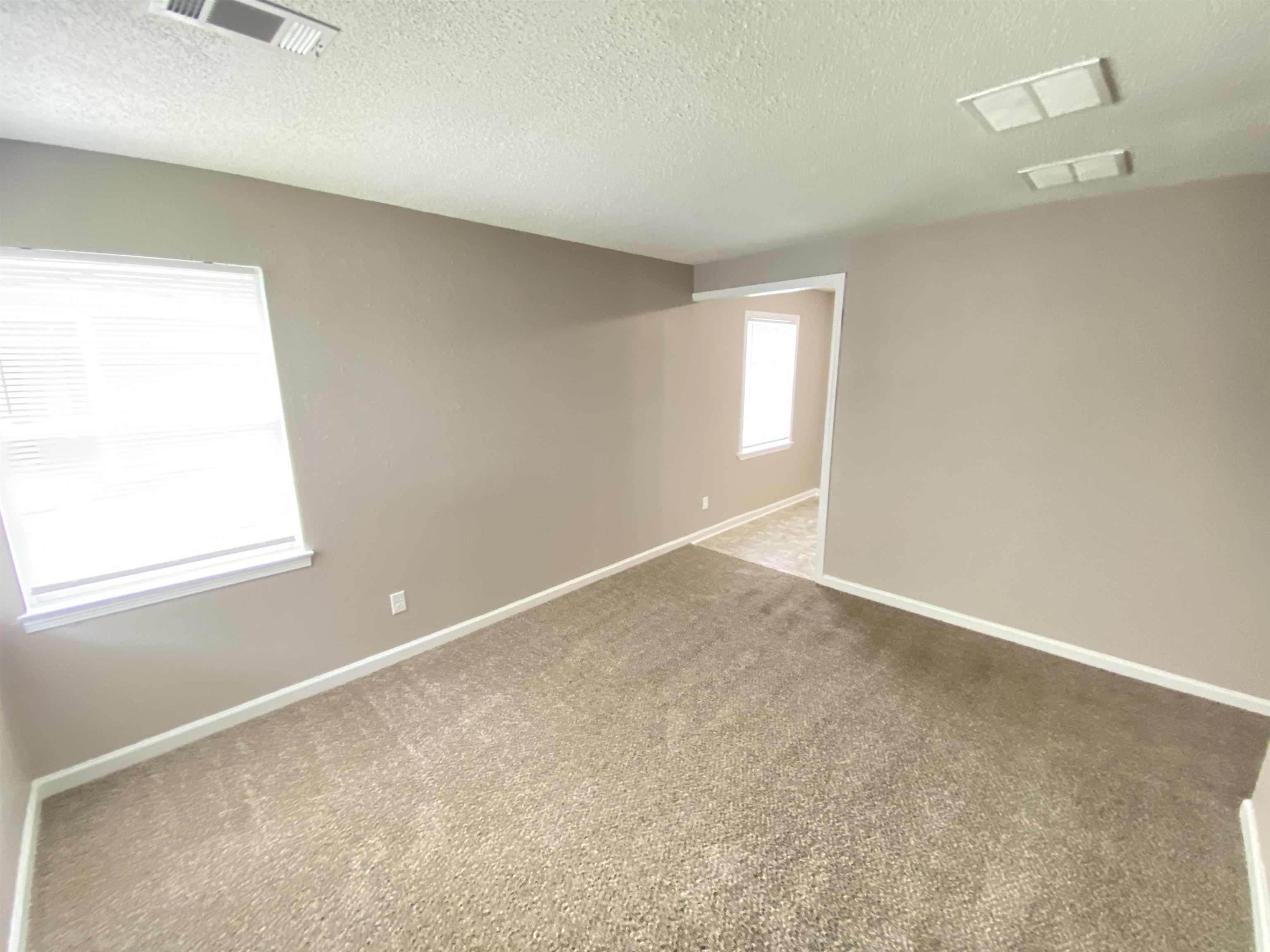 2581 Callie Road Memphis, TN 38127 - Photo 9 of 13 an empty room with a window