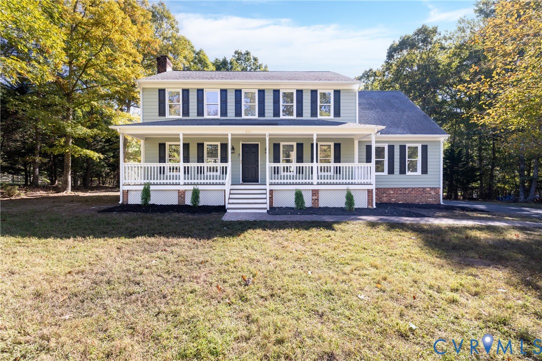 2311 Moseley Road Moseley, VA 23120 - Photo 2 of 50 a front view of a house with swimming pool