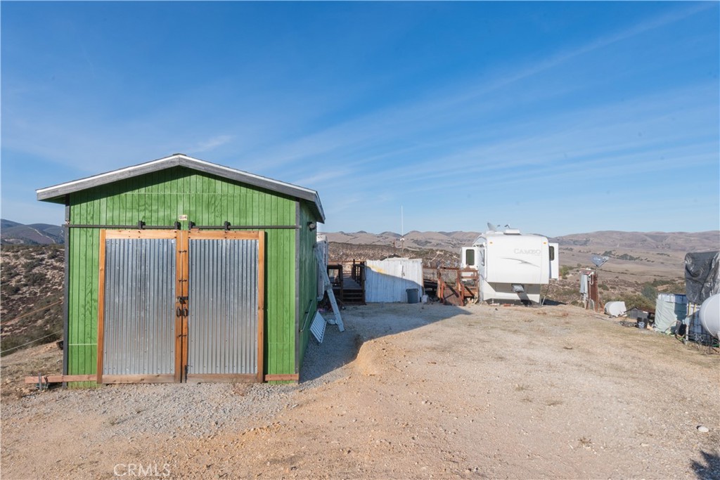 70598 Jolon Road Bradley, CA 93426 - Photo 28 of 43 a view of a house with a outdoor space
