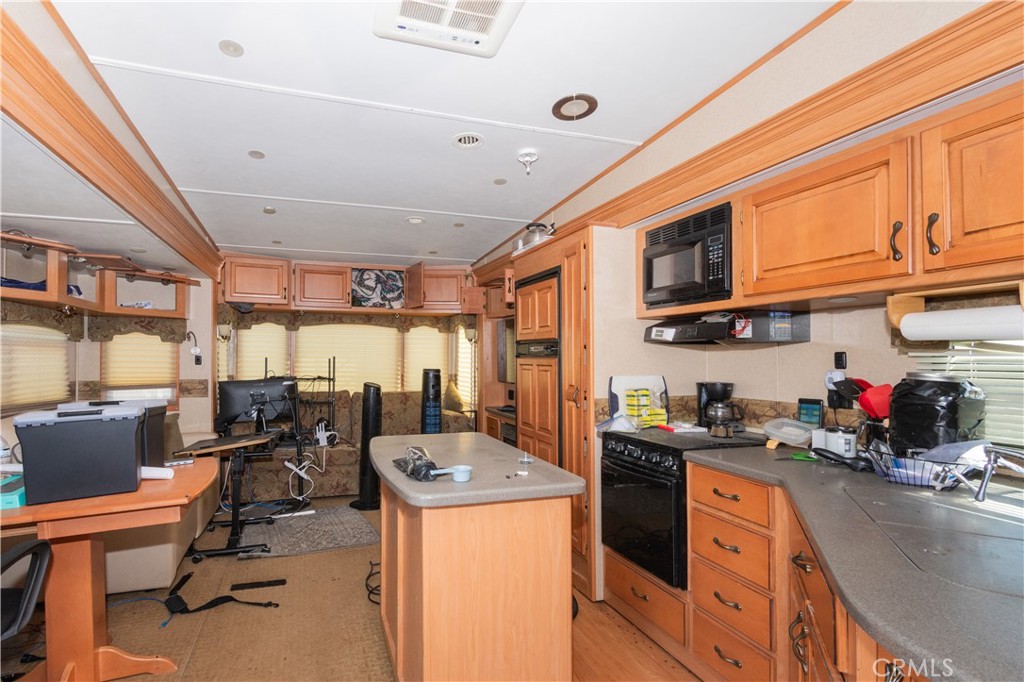 70598 Jolon Road Bradley, CA 93426 - Photo 36 of 43 a kitchen with lots of counter top space