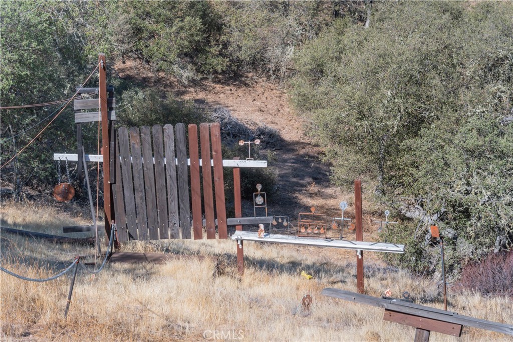 70598 Jolon Road Bradley, CA 93426 - Photo 40 of 43 a view of a house with a wooden fence