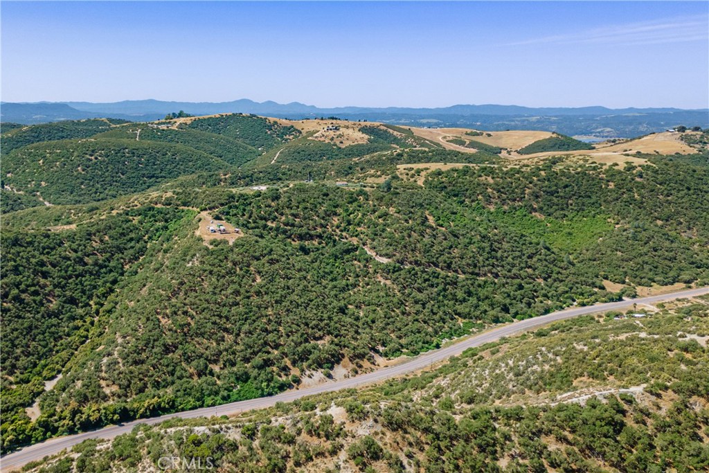 70598 Jolon Road Bradley, CA 93426 - Photo 4 of 43 a view of a lush green forest with mountains in the background