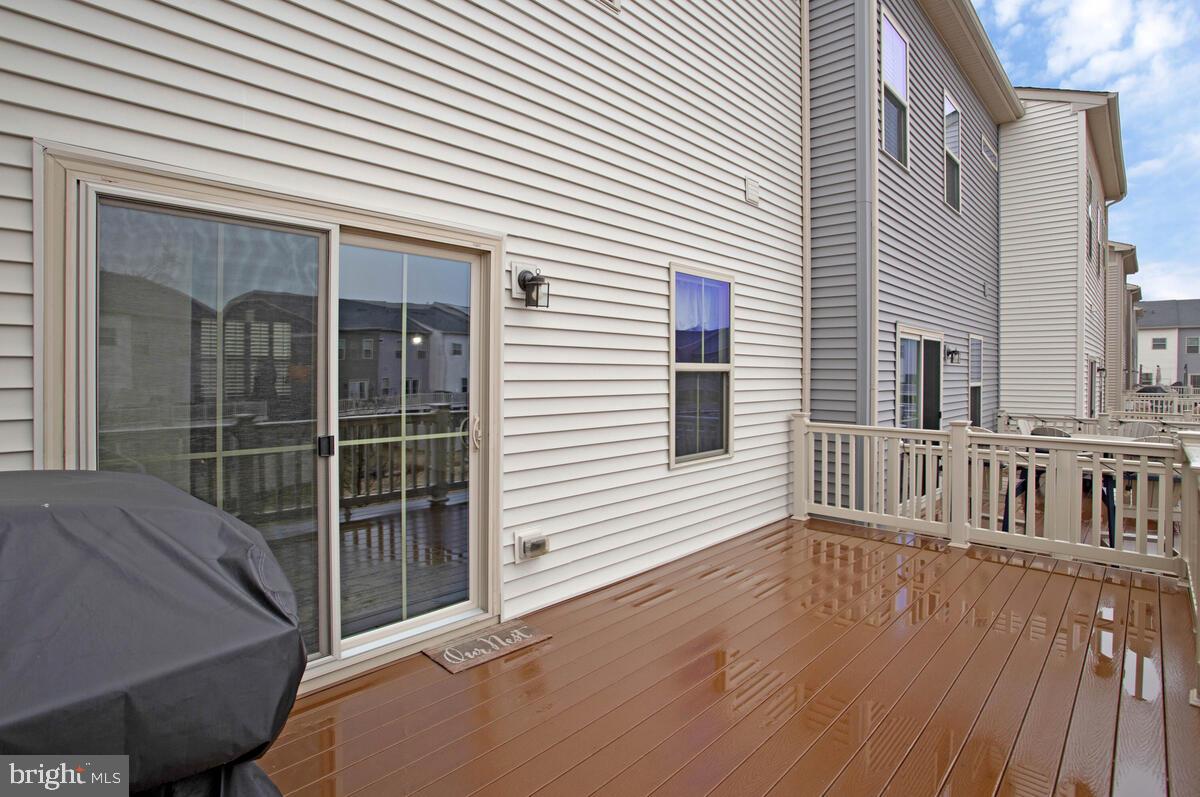 8218 Kippis Road Millersville, MD 21108 - Photo 13 of 40 a view of a deck with a large window