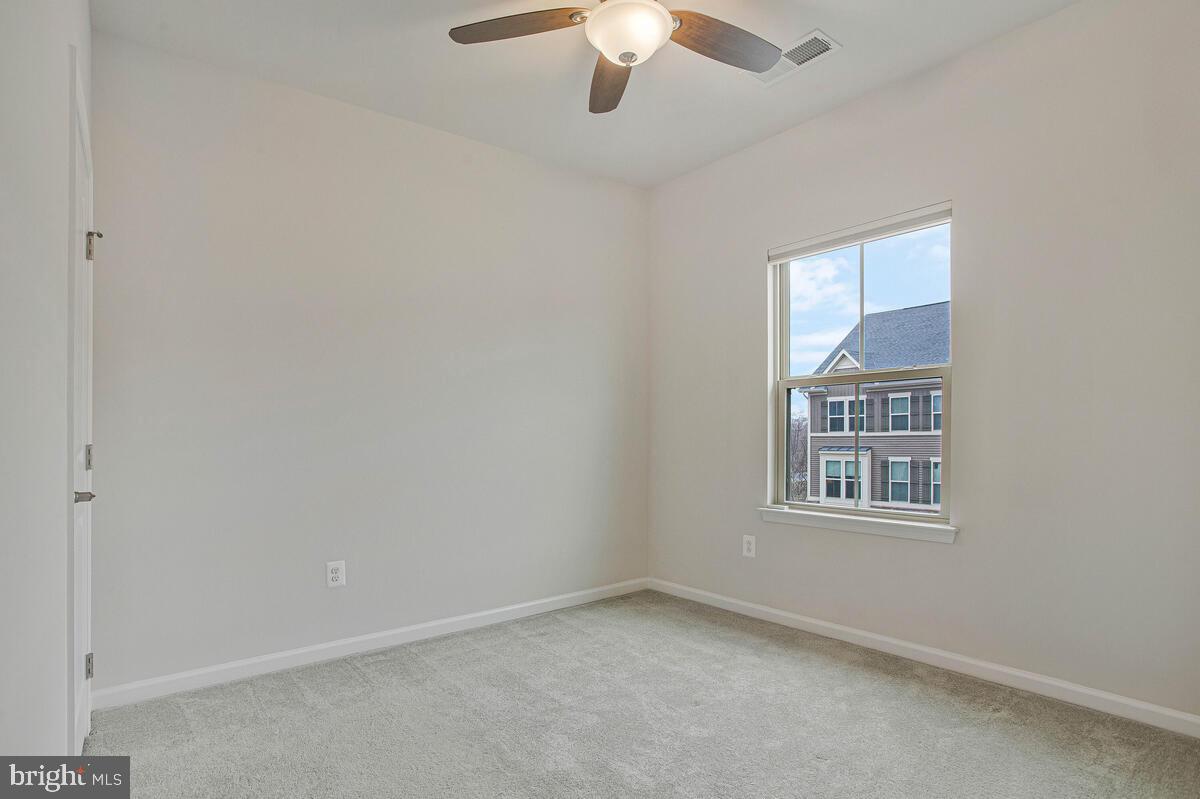 8218 Kippis Road Millersville, MD 21108 - Photo 23 of 40 an empty room with a window