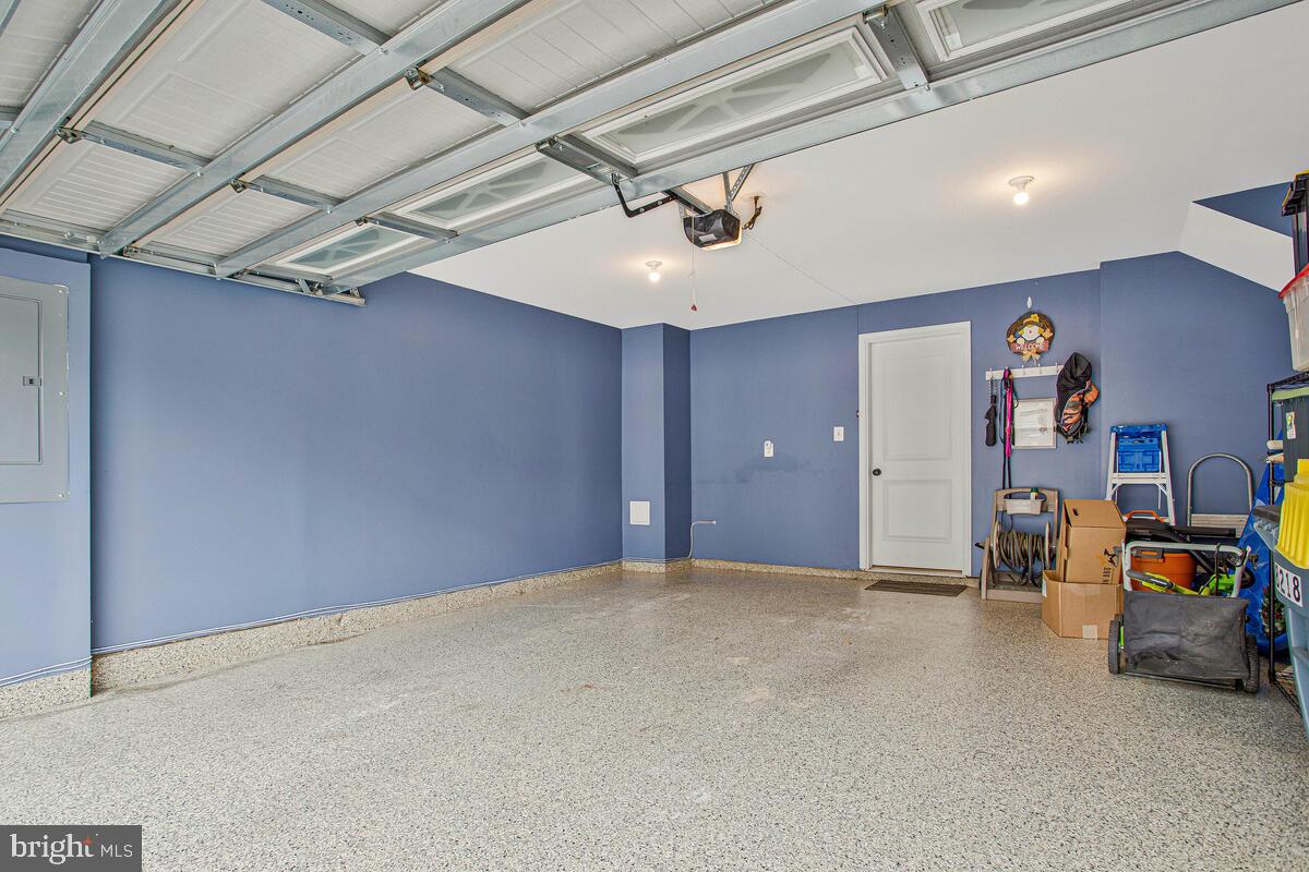 8218 Kippis Road Millersville, MD 21108 - Photo 30 of 40 a view of a livingroom with furniture and a ceiling fan
