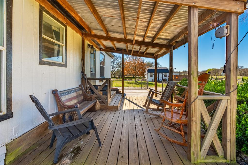 181 Pr 125 Whitney, TX 76692 - Photo 24 of 34 a view of a chairs and table on the deck