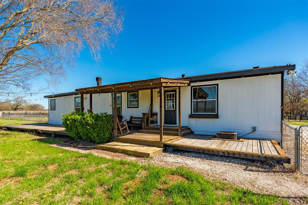 181 Pr 125 Whitney, TX 76692 - Photo 25 of 34 a view of a house with backyard and sitting area