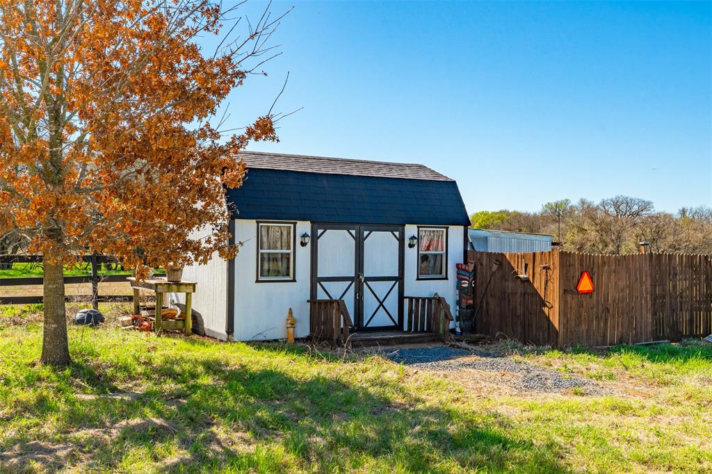 181 Pr 125 Whitney, TX 76692 - Photo 27 of 34 a view of a house with a yard