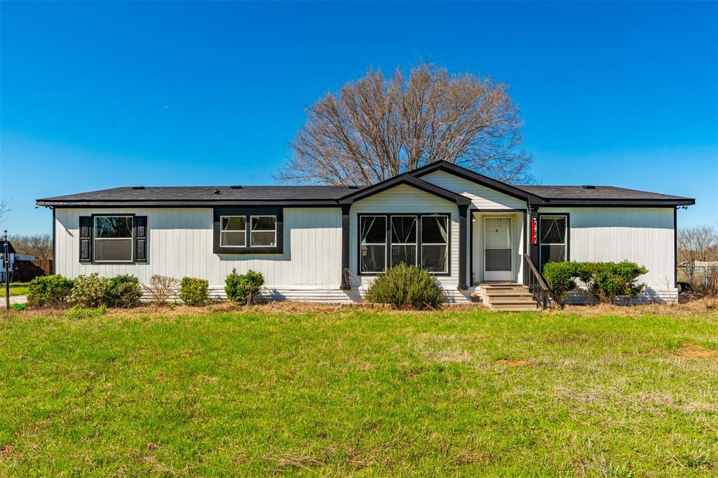 181 Pr 125 Whitney, TX 76692 - Photo 28 of 34 a front view of house with yard and green space