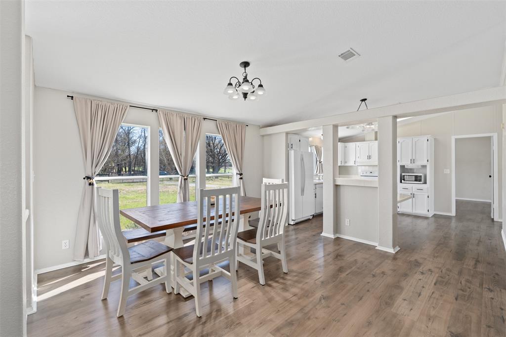 181 Pr 125 Whitney, TX 76692 - Photo 10 of 34 a dining room with furniture and window