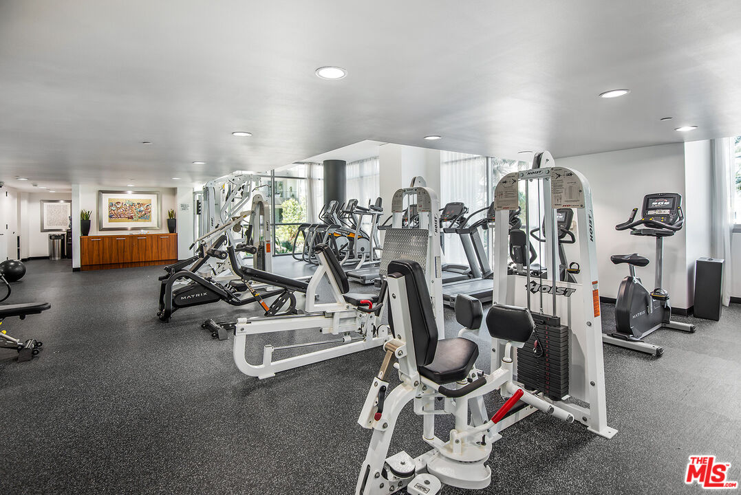 13650 Marina Pointe Drive, Unit 309 Marina del Rey, CA 90292 - Photo 42 of 56 a view of a room with gym equipment