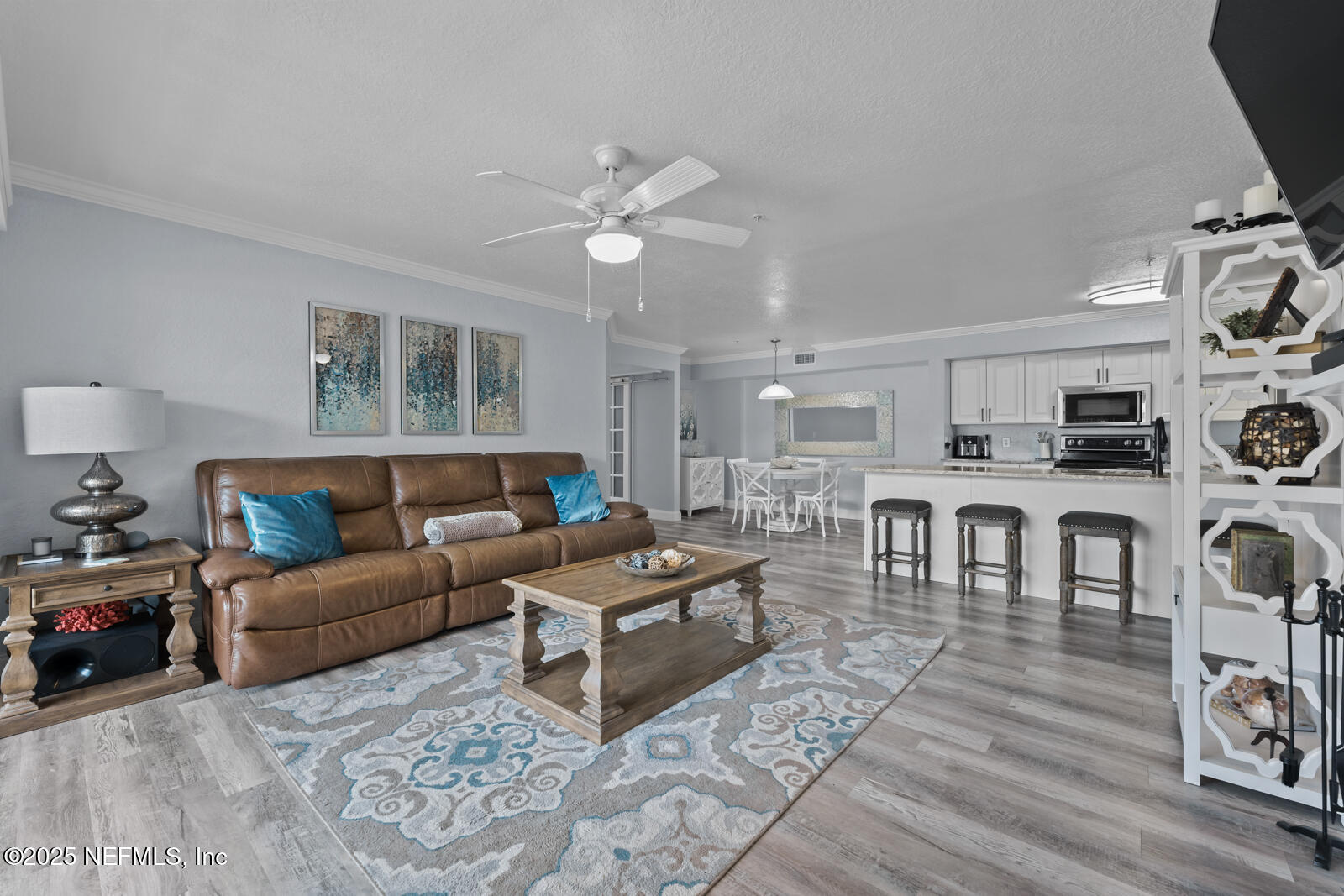 425 Timberwalk Court, Unit 1112 Ponte Vedra Beach, FL 32082 - Photo 13 of 66 a living room with furniture a flat screen tv and a window
