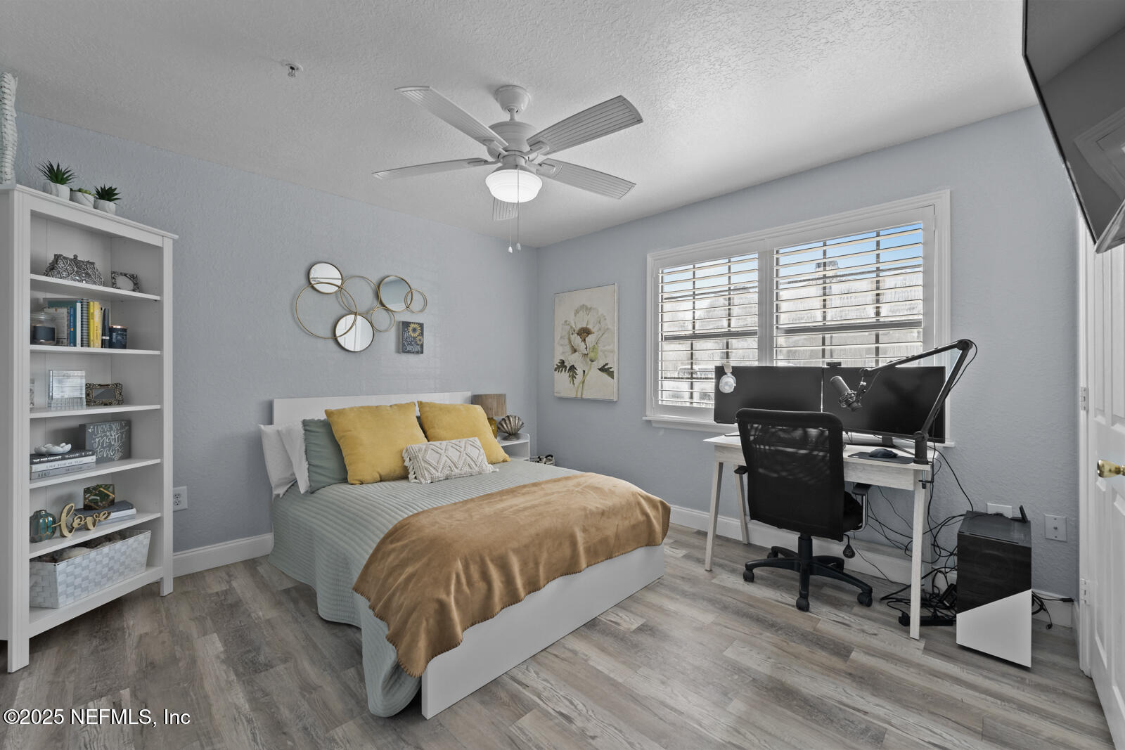 425 Timberwalk Court, Unit 1112 Ponte Vedra Beach, FL 32082 - Photo 23 of 66 a bedroom with a bed and a chandelier