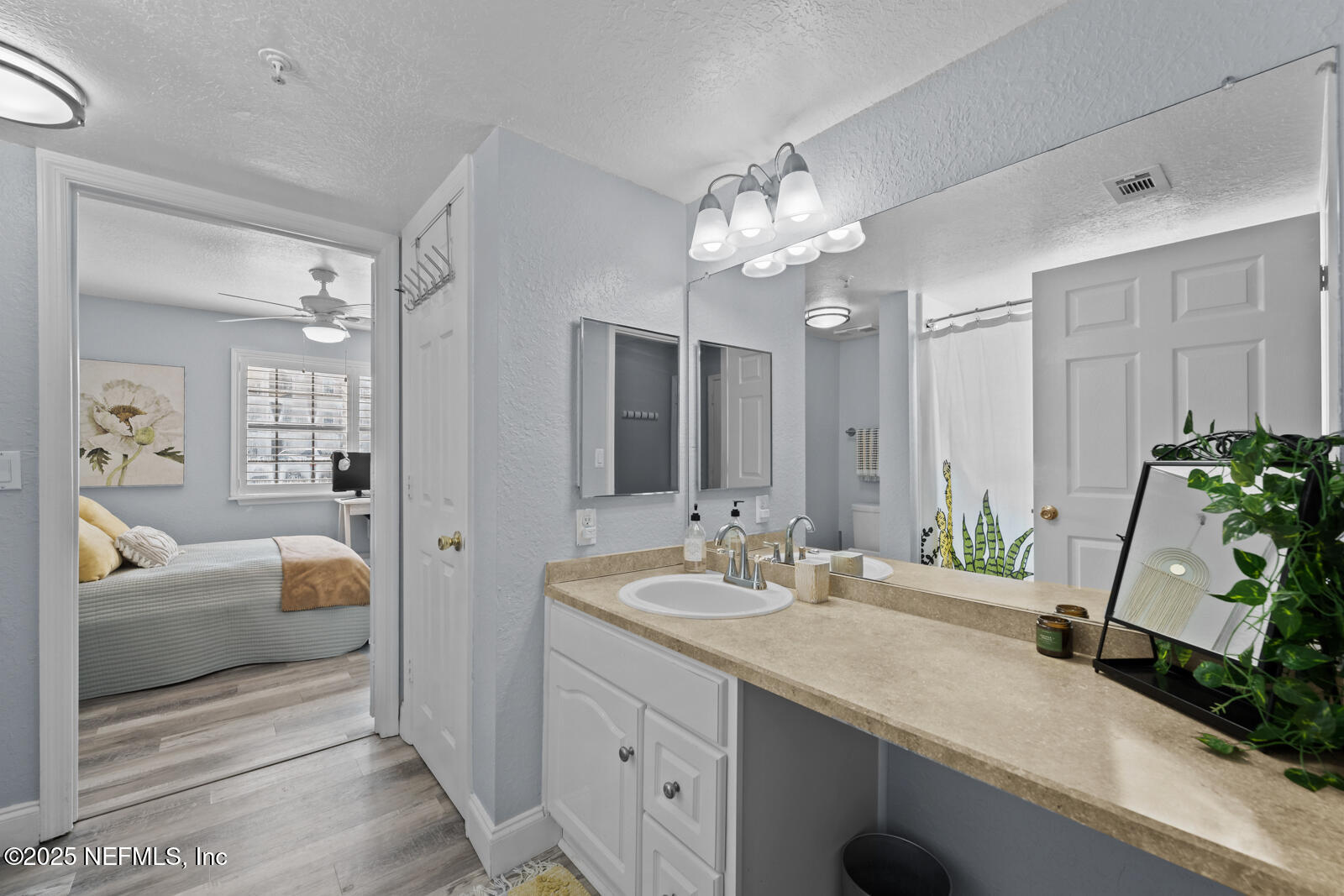 425 Timberwalk Court, Unit 1112 Ponte Vedra Beach, FL 32082 - Photo 24 of 66 a en suite bathroom with a double vanity sink and a mirror