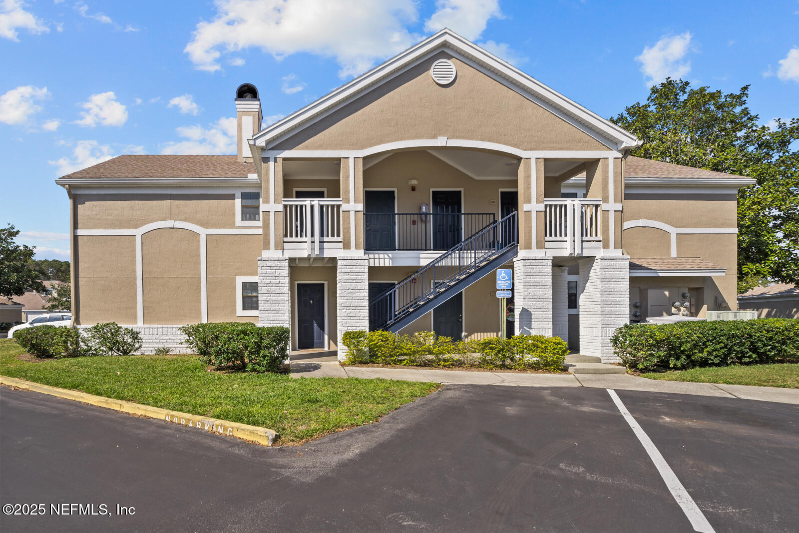 425 Timberwalk Court, Unit 1112 Ponte Vedra Beach, FL 32082 - Photo 3 of 66 a front view of a house with a yard