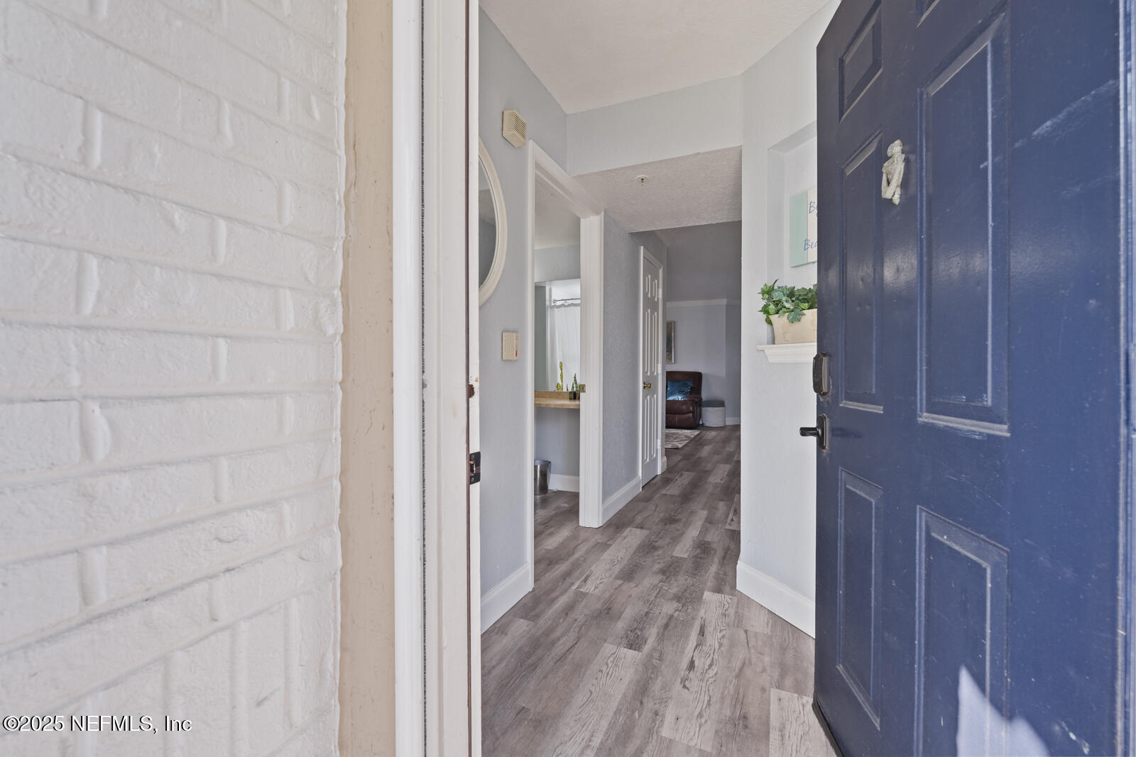 425 Timberwalk Court, Unit 1112 Ponte Vedra Beach, FL 32082 - Photo 4 of 66 a view of a hallway with wooden floor