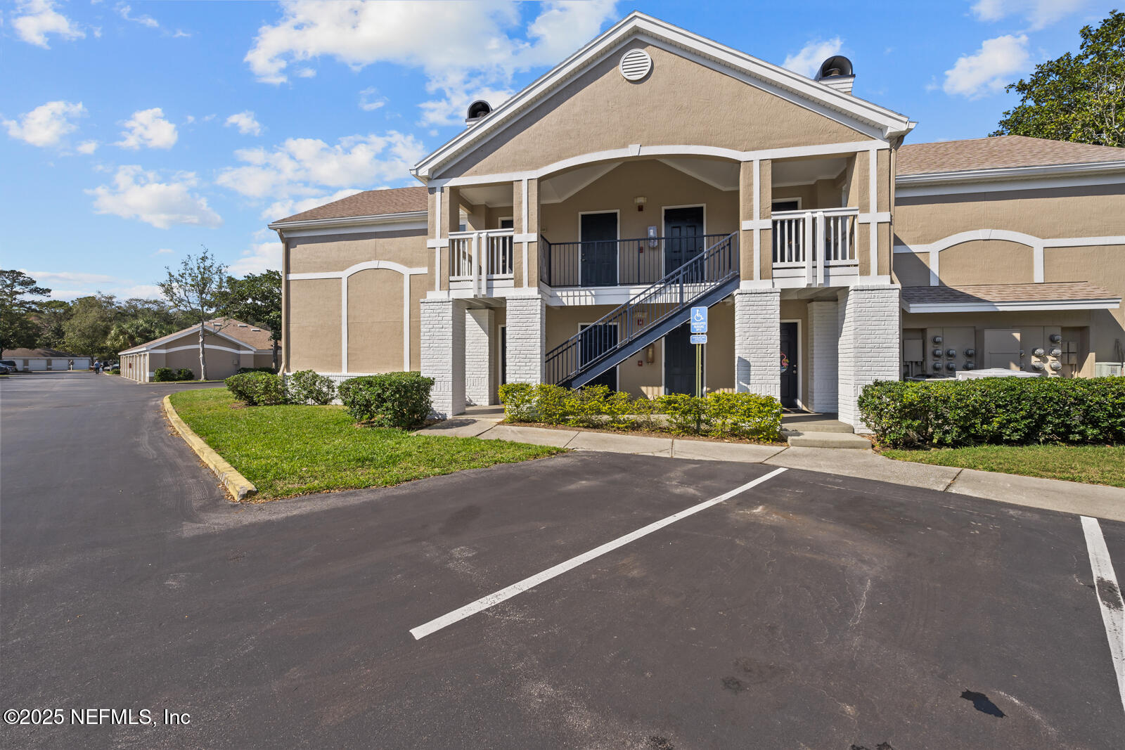 425 Timberwalk Court, Unit 1112 Ponte Vedra Beach, FL 32082 - Photo 42 of 66 a front view of a house with a yard and garage