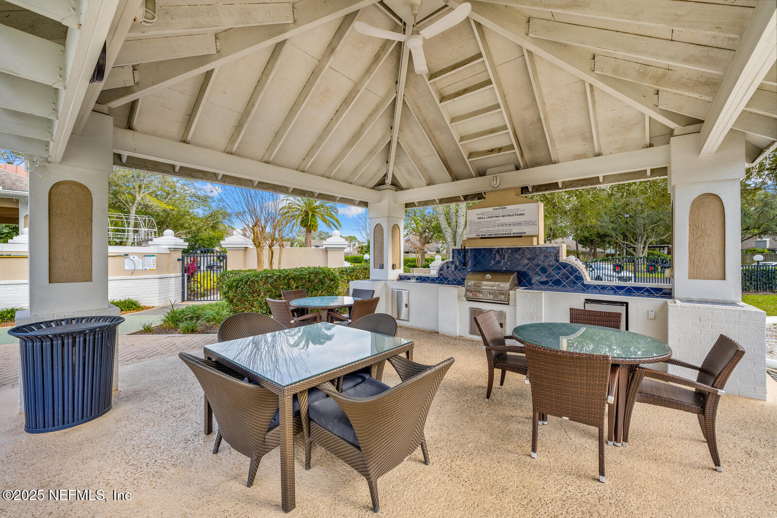 425 Timberwalk Court, Unit 1112 Ponte Vedra Beach, FL 32082 - Photo 59 of 66 a view of a patio with a dining table and chairs